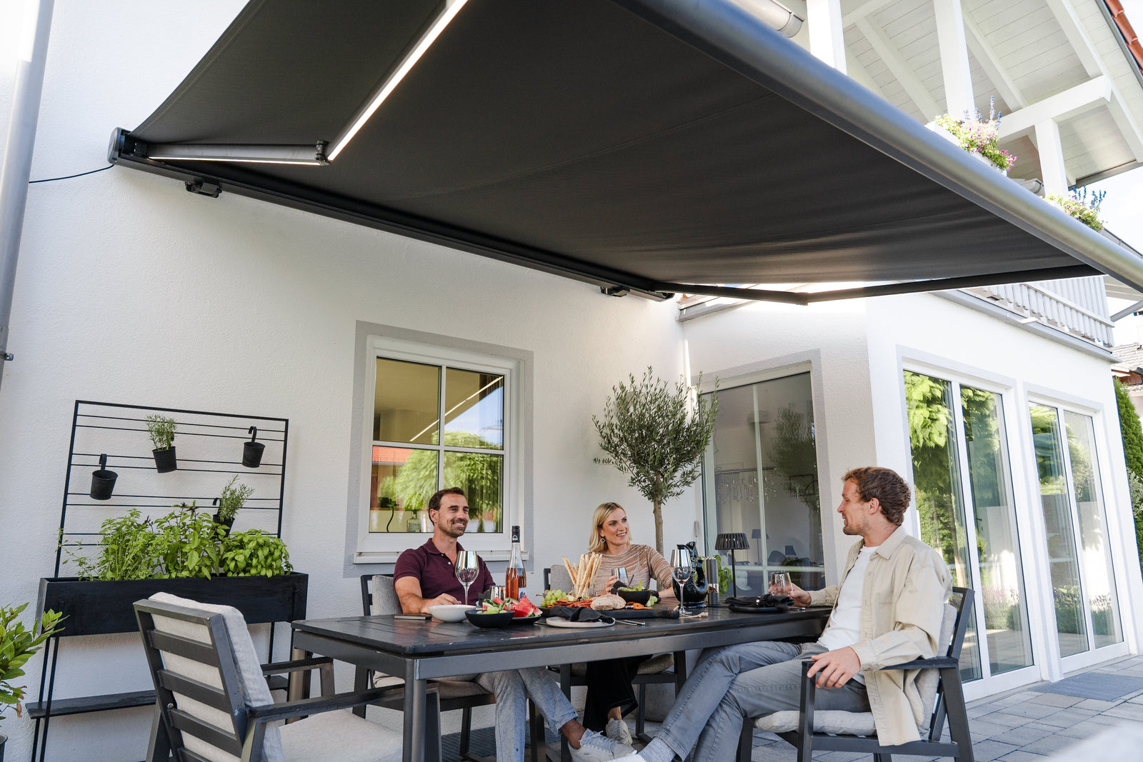 UPF 50+ rated retractable awning shading an outdoor patio in Australia