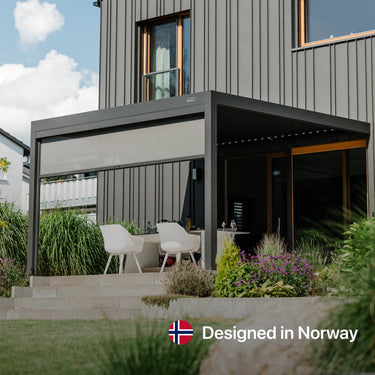 Modern outdoor pergola with a house in the background, featuring the 'Designed in Norway' logo.