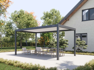 Dark grey pergola with closed solid roof panels providing full shade over garden furniture