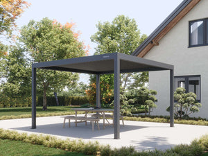 Dark grey rectangular pergola frame enclosing wooden dining set on outdoor terrace