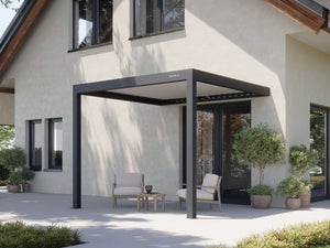 Black metal frame PERGOLUX Pergola 4 attached to home exterior with solid roof shade