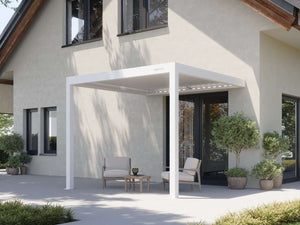 White attached pergola with open louvers over patio seating