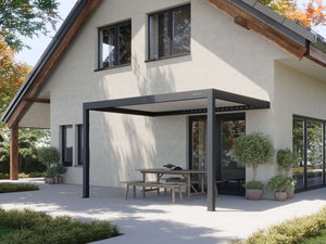 Matte black freestanding pergola with open slats near glass doors