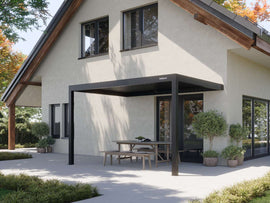 black attached pergola mounted to beige stucco wall shading wooden dining set near sliding doors