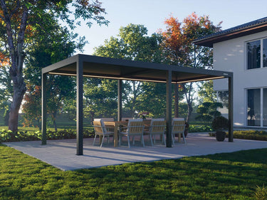 Dark grey motorized aluminium Pergola 4 Pro with open louvres and warm LED strip lighting on stone patio