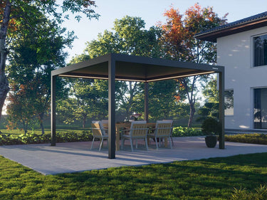 Closed dark grey aluminium pergola with perimeter LED lighting on paved terrace