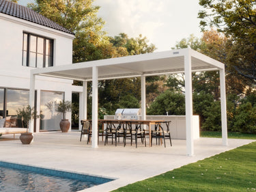 white open pergola with louvered roof on stone patio