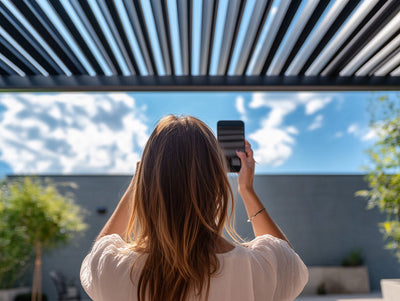 Woman opening pergolux pergola