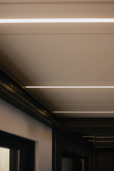 Underside white horizontal louvres with bright linear integrated LED strips